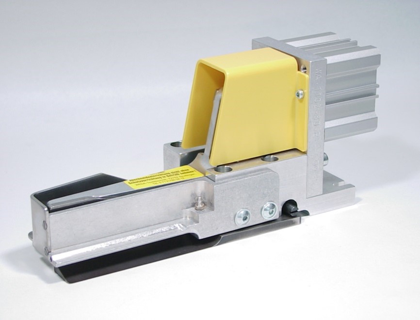 WEDA WA-1102 pneumatic tape cutter fitted to a sewing machine