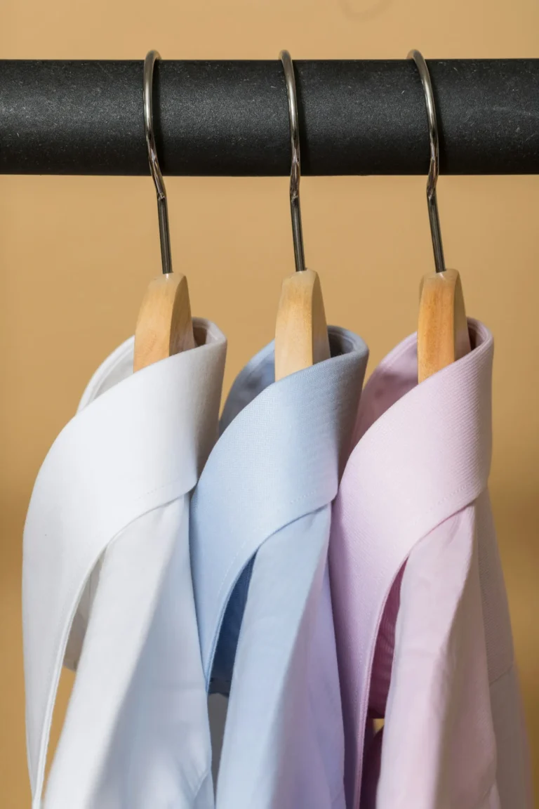 Dress shirts hanging on hangers